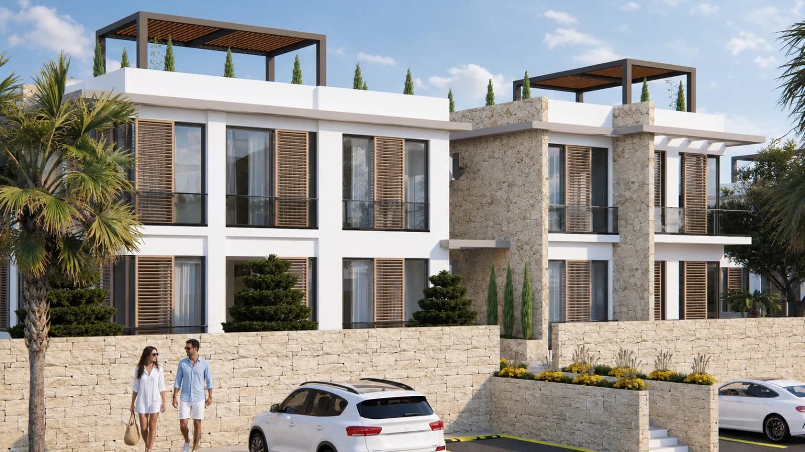 Street side of an apartment block with roof terraces