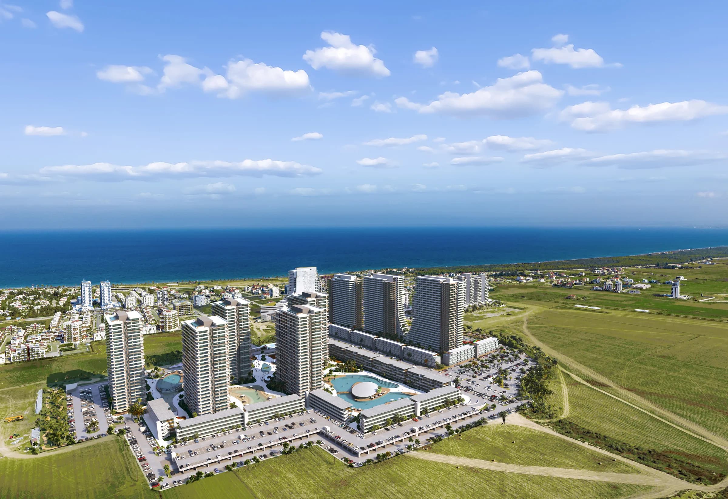 BLU z lotu ptaka obok Grand Sapphire Resort, w tle morze (wizualizacja)
