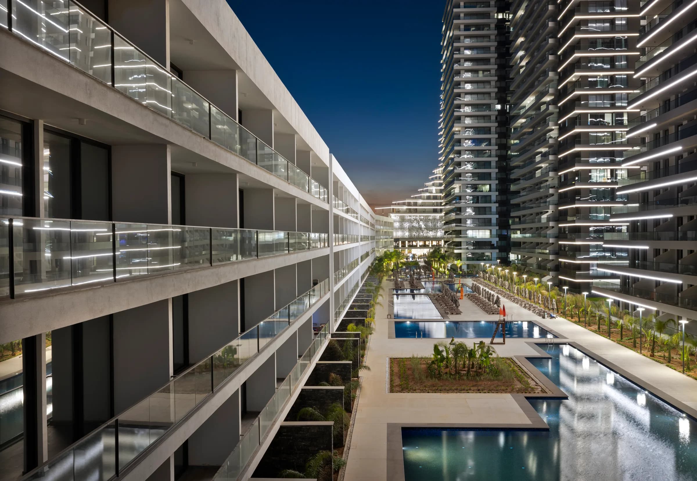 Five-storey block with terraces and a pool