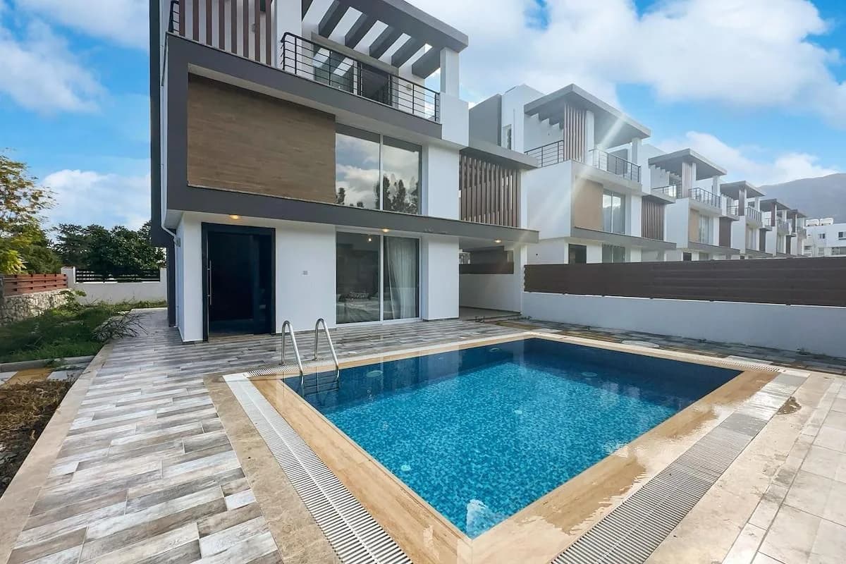 Pool terrace with the neighbouring villas behind