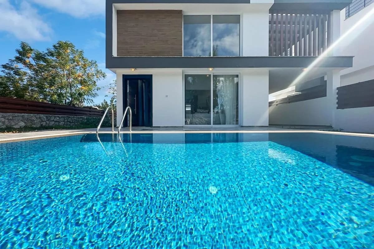Private pool in front of a villa