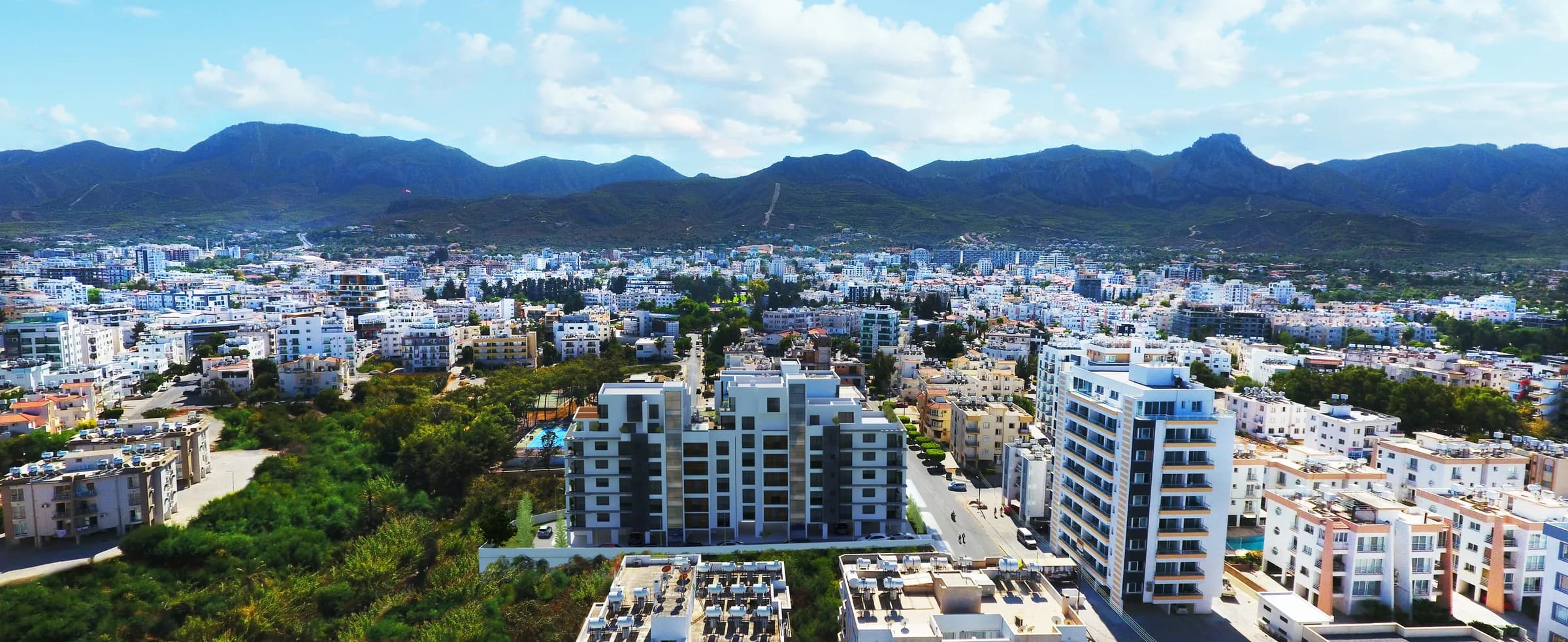 Kaşgar Residence in Kyrenia, aerial photomontage towards the Kyrenia mountains
