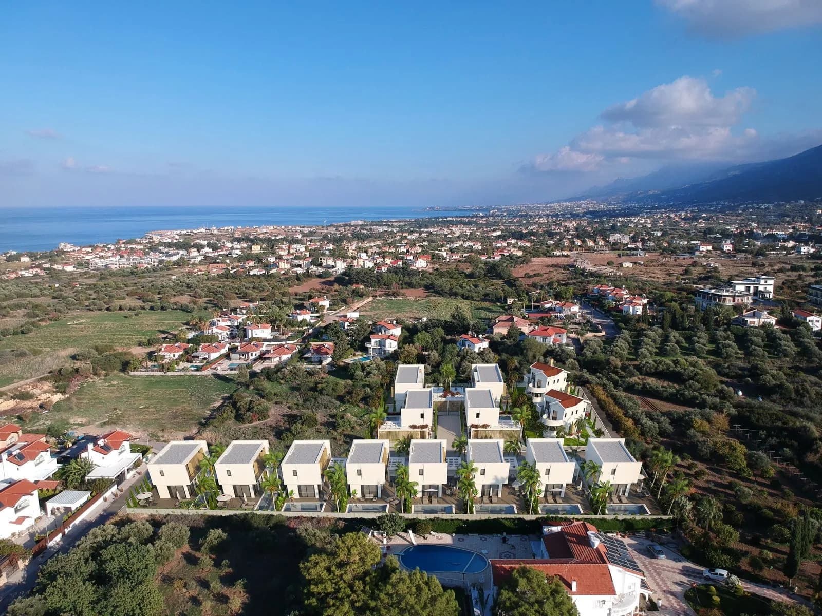 Villas A1–A8 with Kyrenia and the coast behind, photomontage